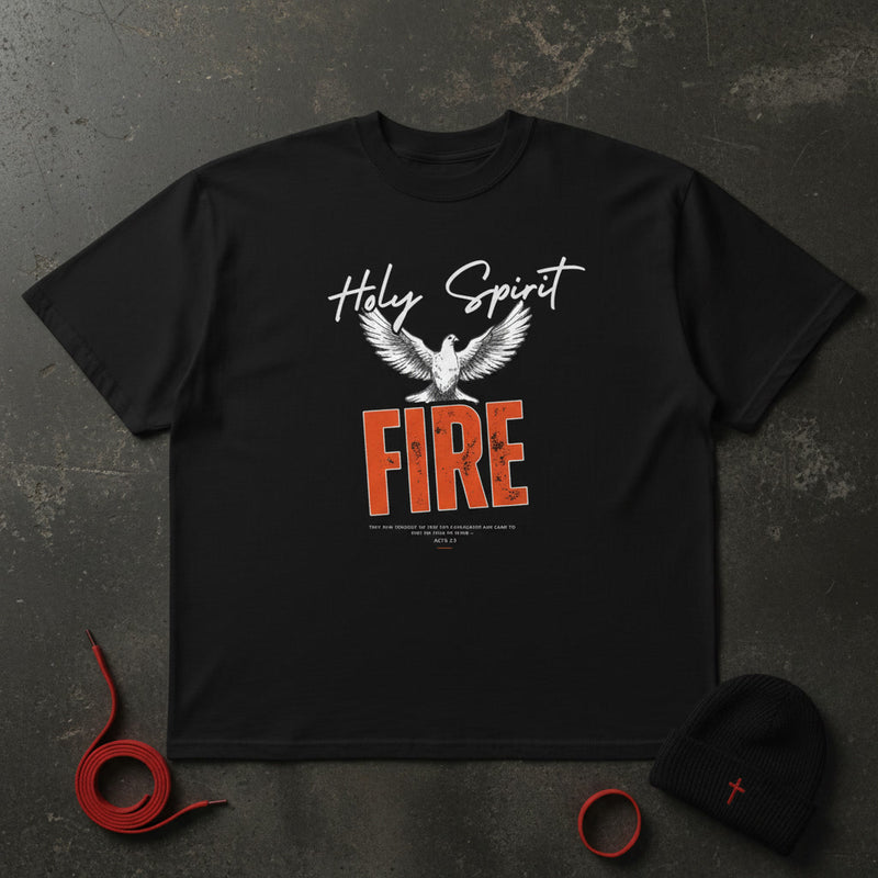 Holy Spirit Fire oversized tee in black flat lay — descending dove over burning orange FIRE type, Acts 2:3, KingJesus.shop