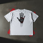 By His Wounds oversized tee in white folded — pierced hand with the Lamb, Isaiah 53:5, KingJesus.shop